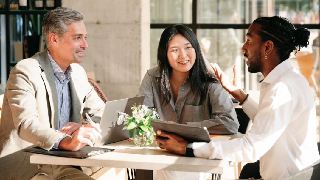 Financial adviser discussing a financial planning options with clients